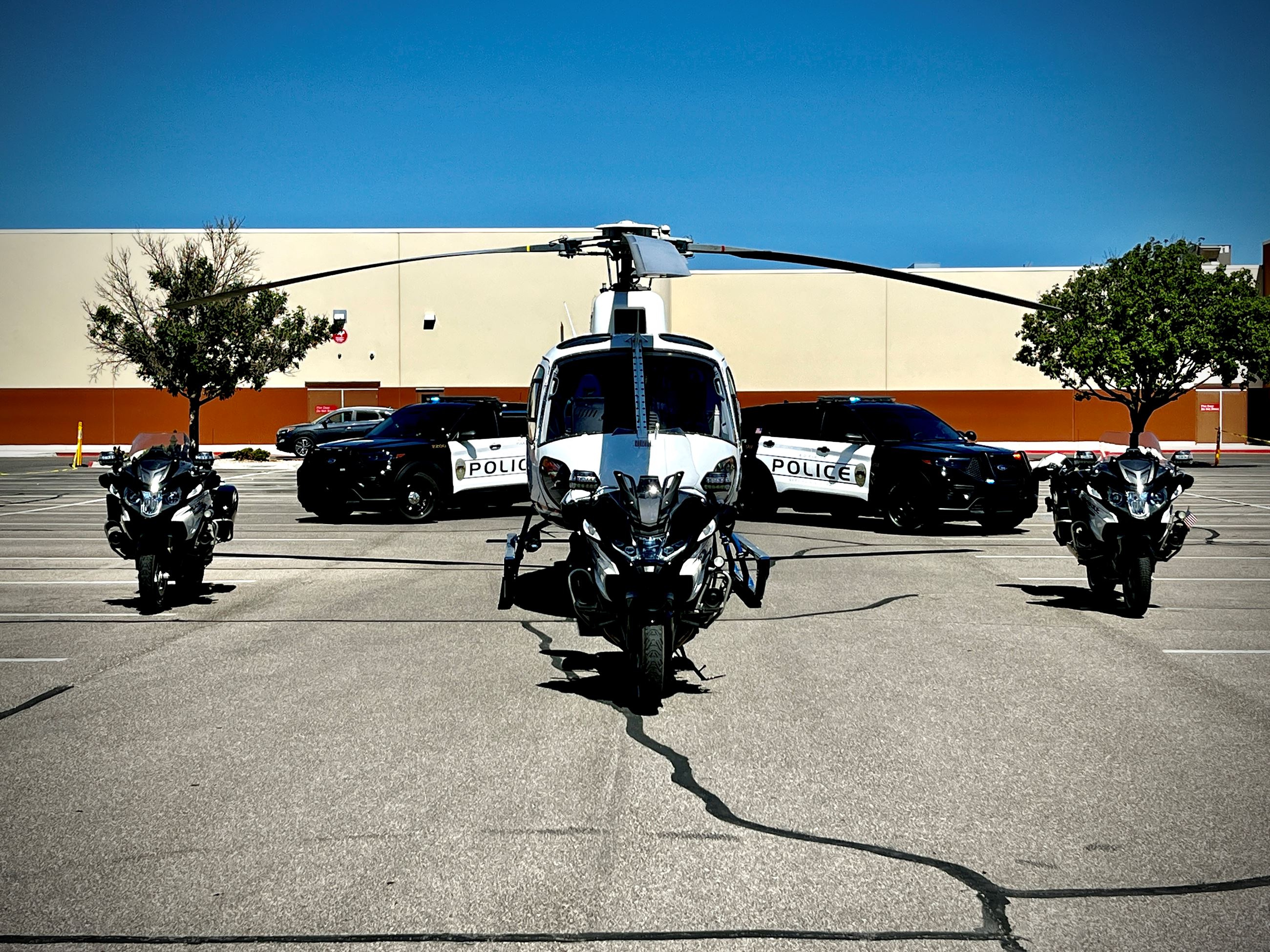 Police vehicles and helicopter